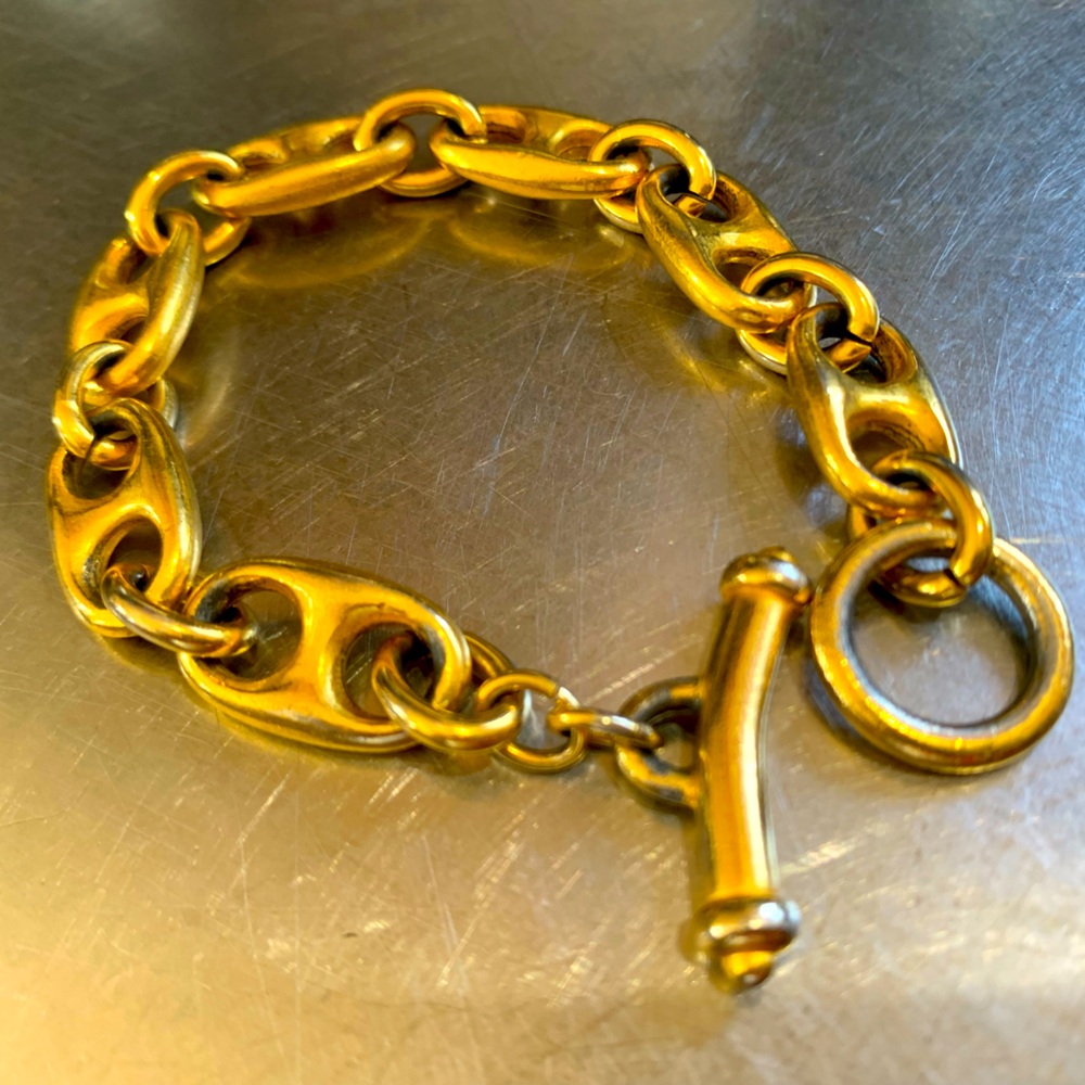 Large link gold wash toggle bracelet.